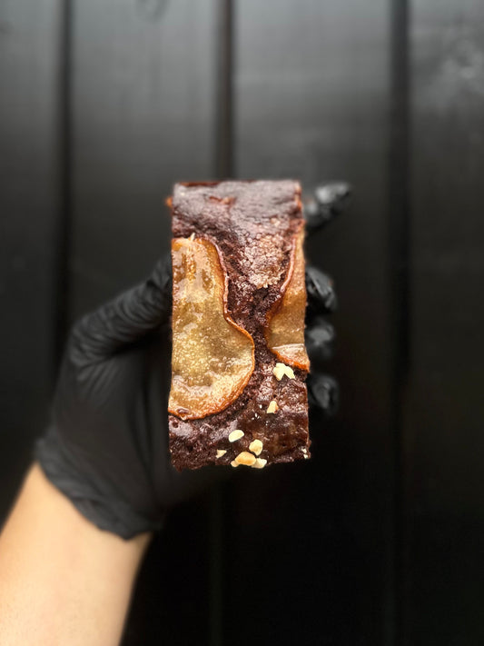 Pear and chocolate cake with roasted hazelnuts