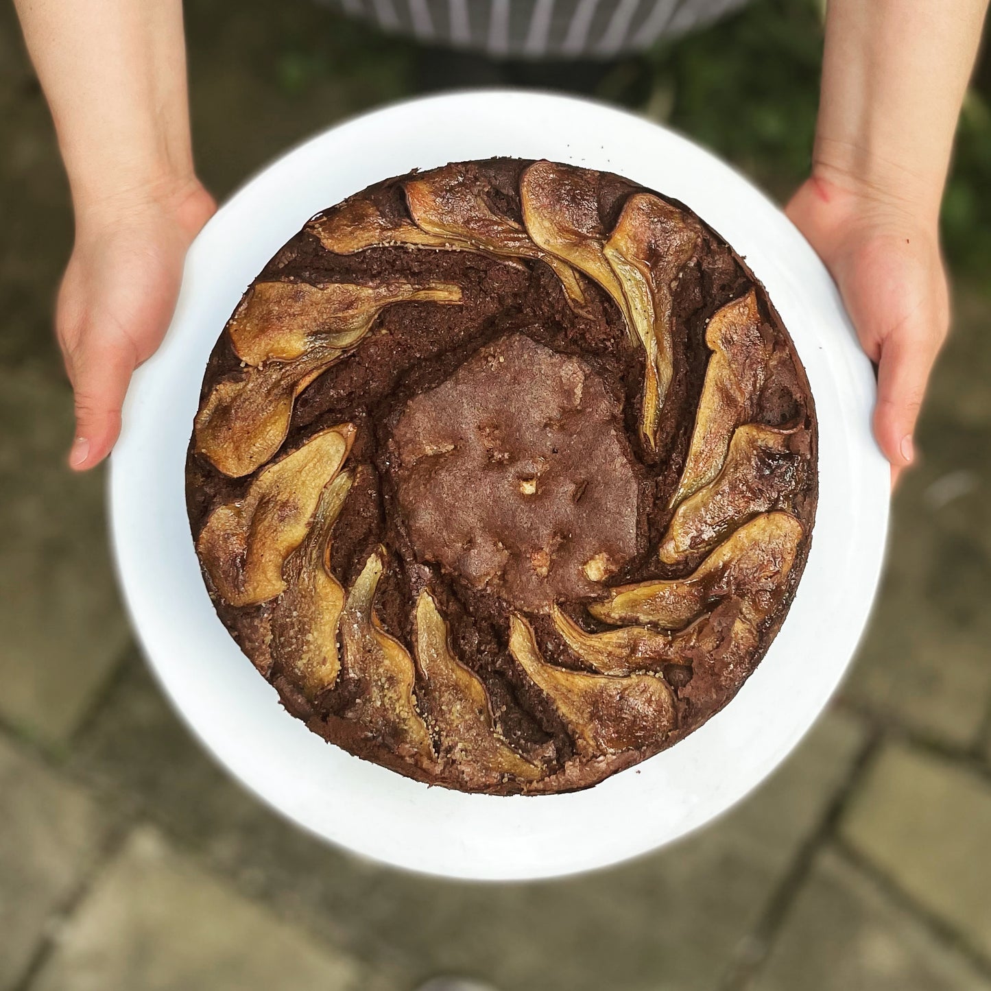Pear and chocolate cake with roasted hazelnuts