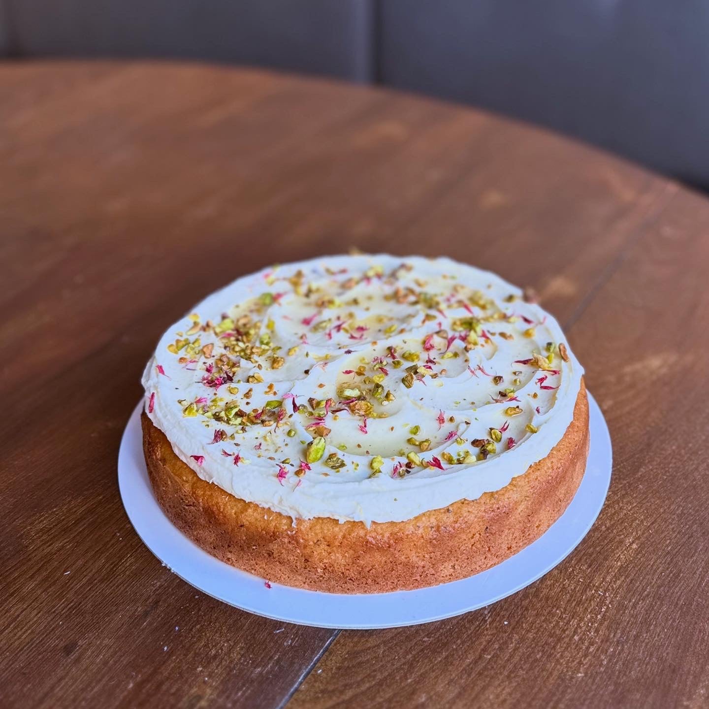 Pistachio cake with honey cream cheese frosting