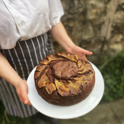 Pear and chocolate cake with roasted hazelnuts